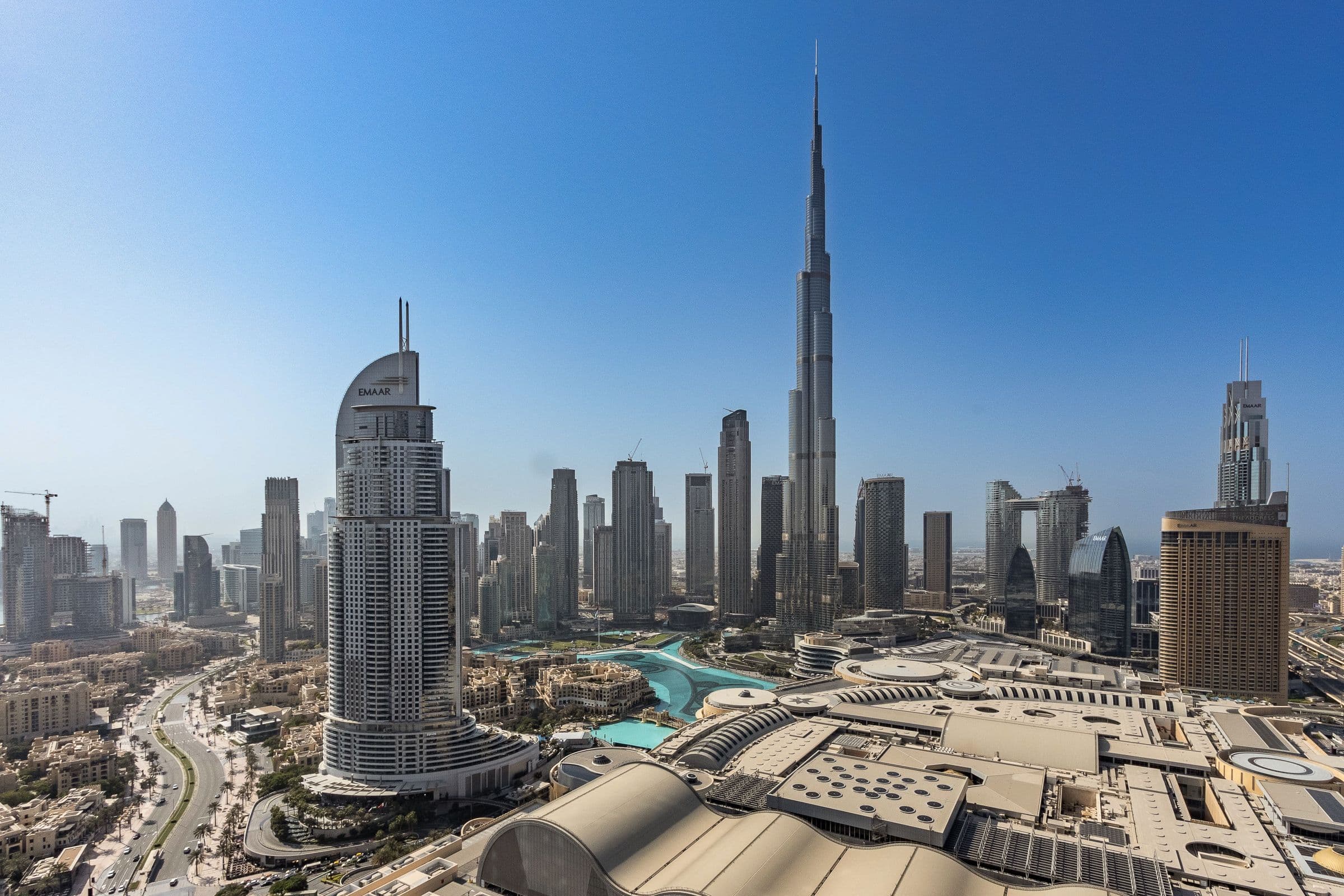 Clear daytime Dubai skyline with Burj Khalifa and city towers